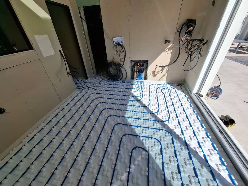 Réalisation d'une extension de plancher chauffant/rafraichissant