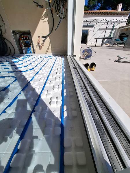 Réalisation d'une extension de plancher chauffant/rafraichissant