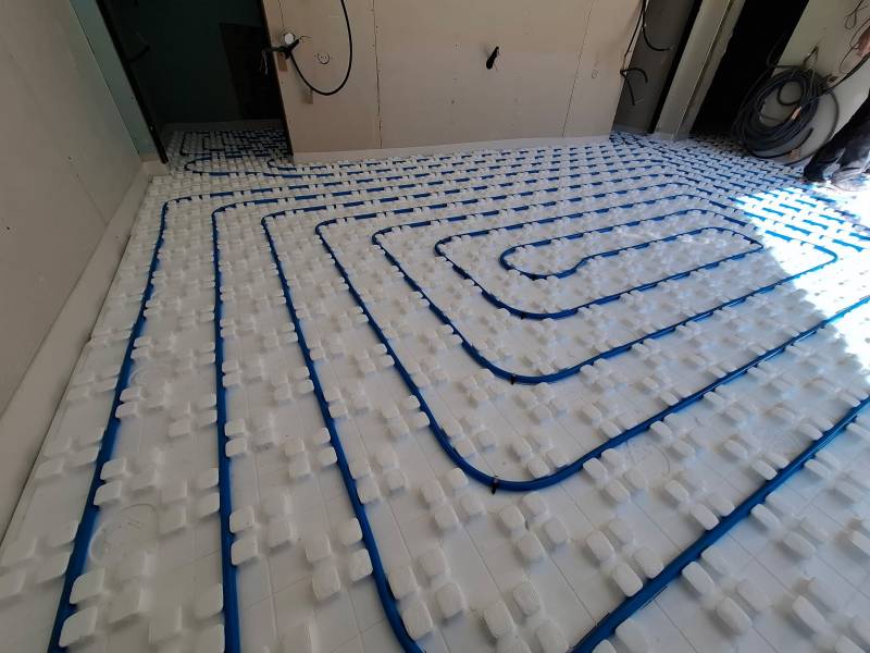 Réalisation d'une extension de plancher chauffant/rafraichissant